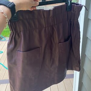 Zara burgundy skirt, size medium. Looks like leather, but not. NWT
